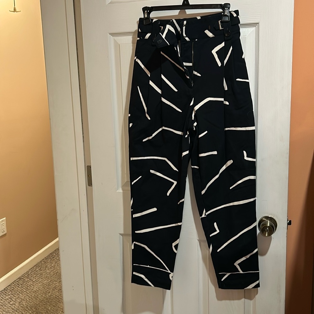Wonderful women’s black with white design pants.